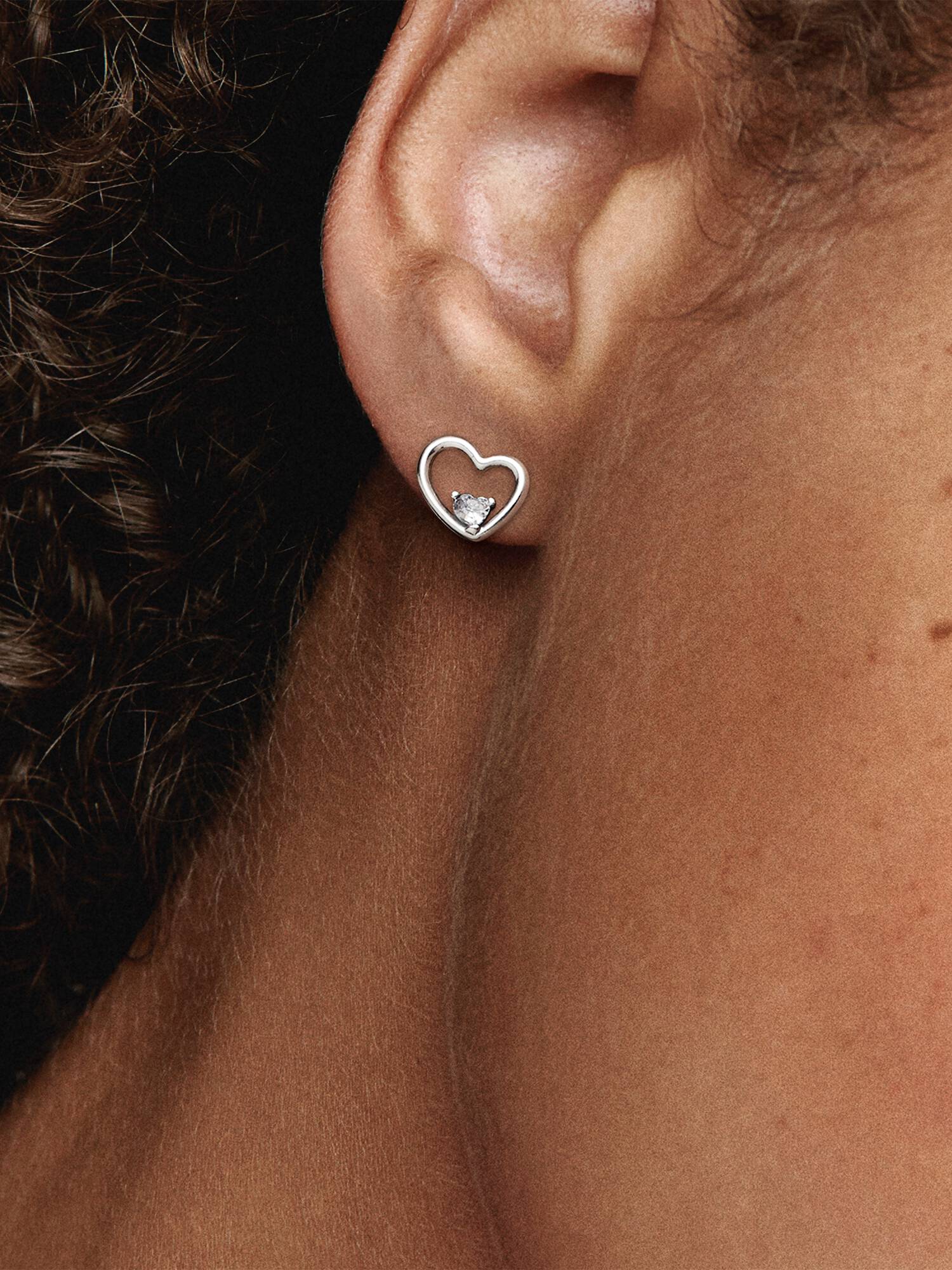 Asymmetrical heart stud earrings with clear cubic zirconia