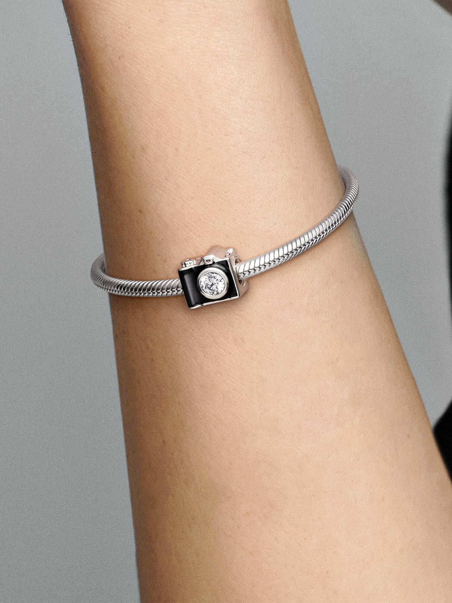 Camera silver charm with black enamel and cubic zirconia