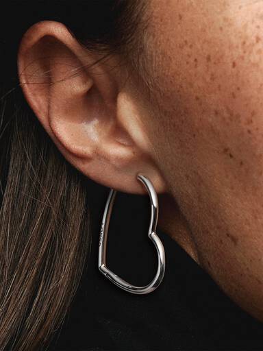 Asymmetrical heart silver hoop earrings