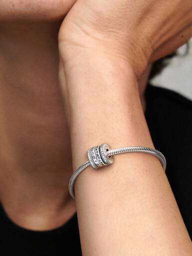 PANDORA logo silver spinning charm with clear cubic zirconia