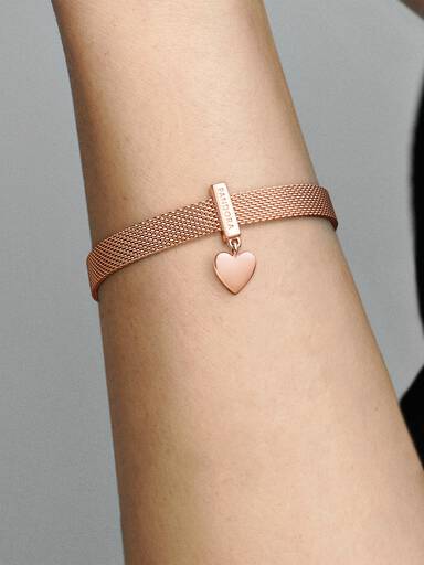 PANDORA Reflexions dangling heart clip charm in 14k rose gold-plated