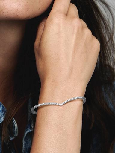 Wishbone silver bangle with clear cubic zirconia