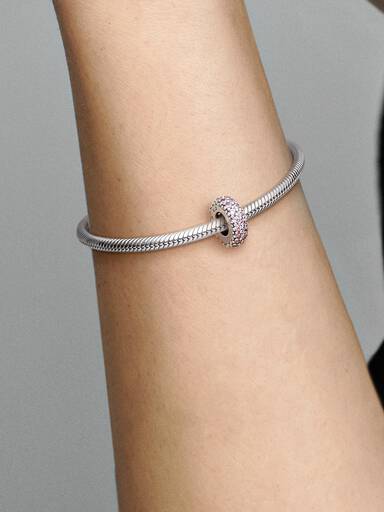 Abstract silver spacer with pink cubic zirconia
