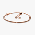 14k Rose gold-plated bangle with clear cubic zirconia and sliding clasp 14k Rose gold-plated bangle with clear cubic zirconia and sliding clasp