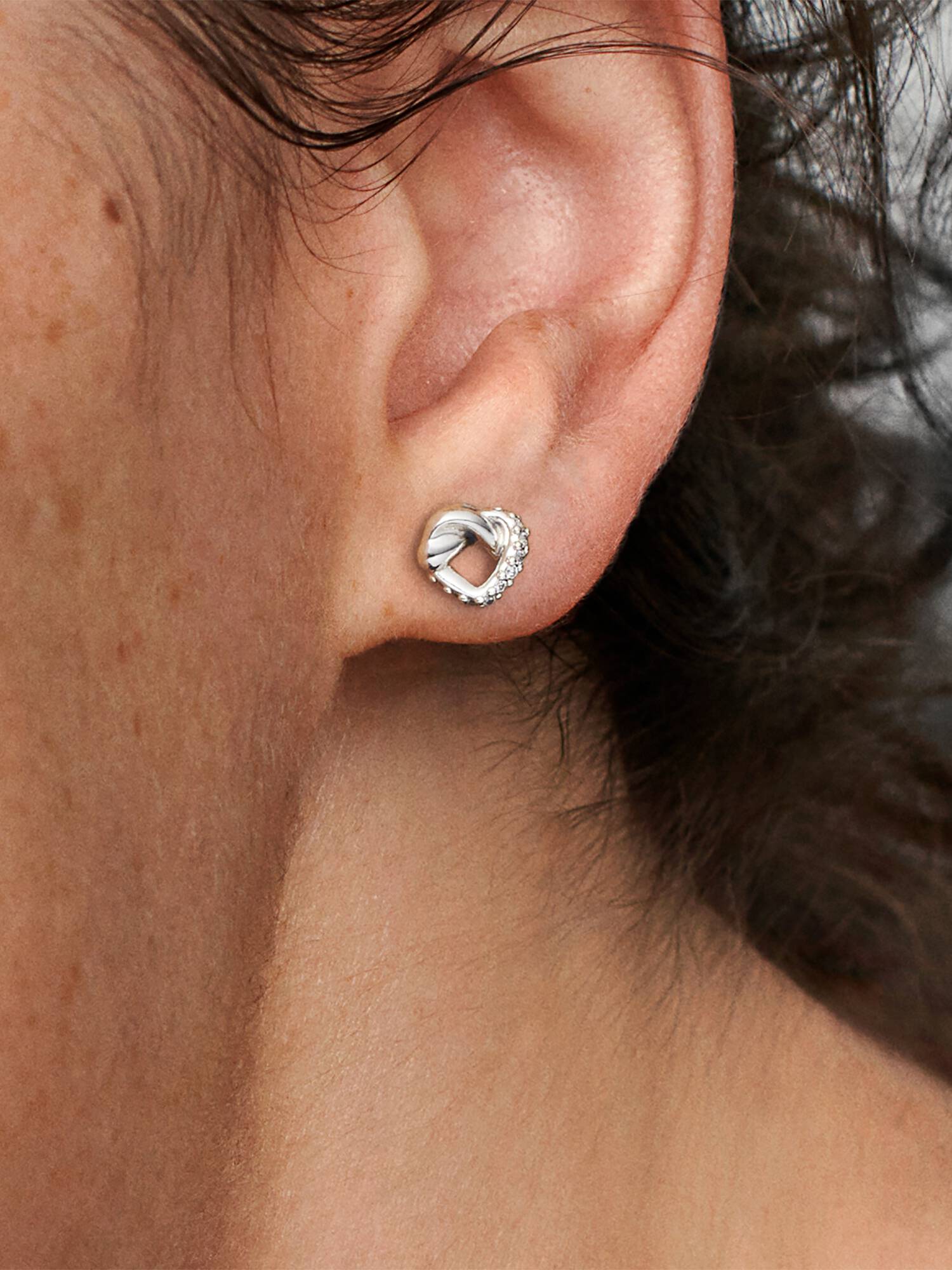 Knotted hearts silver stud earrings with clear cubic zirconia