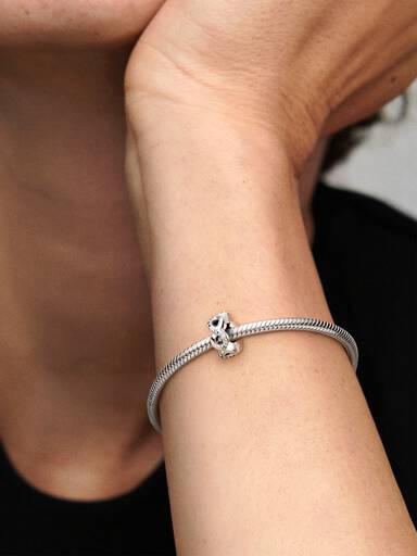Infinity silver spacer with clear cubic zirconia