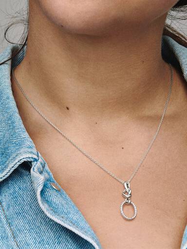 Knotted hearts silver pendant with clear cubic zirconia and necklace