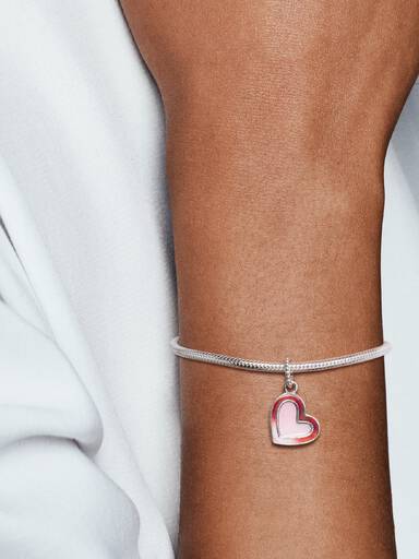 Asymmetrical heart silver dangle with shaded red and pink enamel