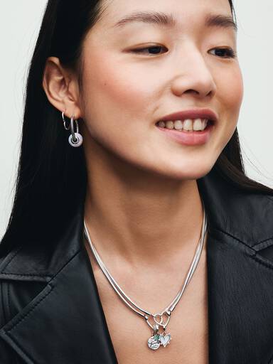 Asymmetrical heart silver hoop earrings